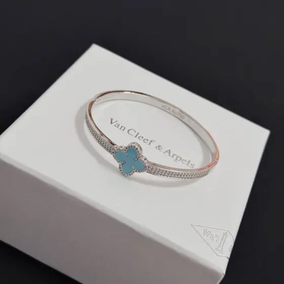 Van Cleef Arpels Alhambra bracelet Silver-toned white gold metal turquoise blue four-leaf clover inlay clear diamond accents 17cm