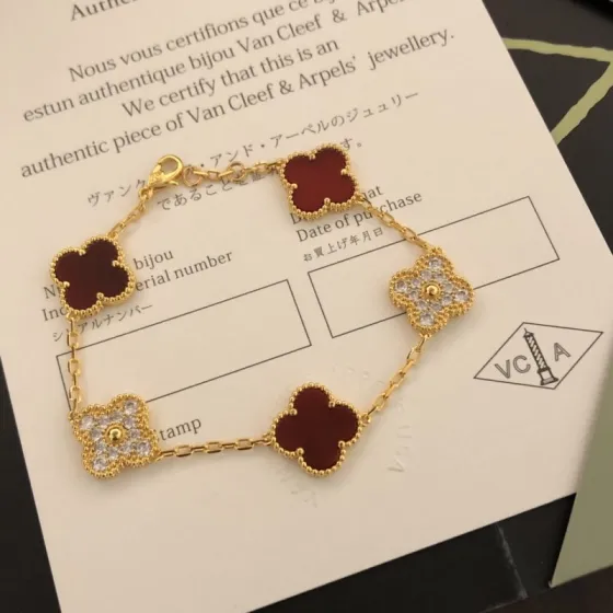 Van Cleef Arpels Vintage Alhambra bracelet 18k yellow gold with burgundy carnelian and clear diamond accents 18cm
