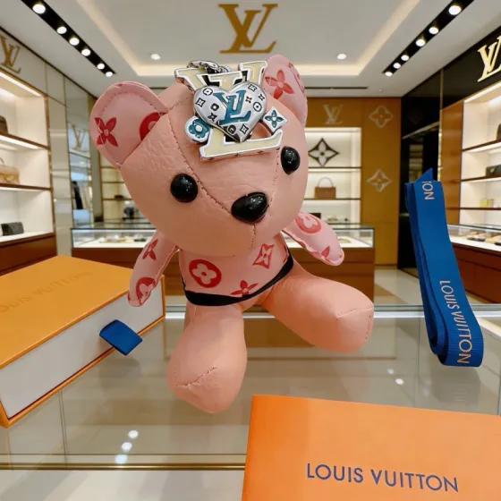 Louis Vuitton Anger Forest Bear Charm pendant Pink leather with red monogram print silver-tone metal with blue and white enamel accents black plastic eyes and nose 12cm