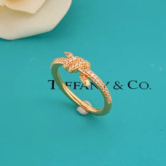 Tiffany Co Knot ring 18k yellow gold with clear pave diamonds 18k white gold with clear pave diamonds 18k rose gold with clear pave diamonds 7