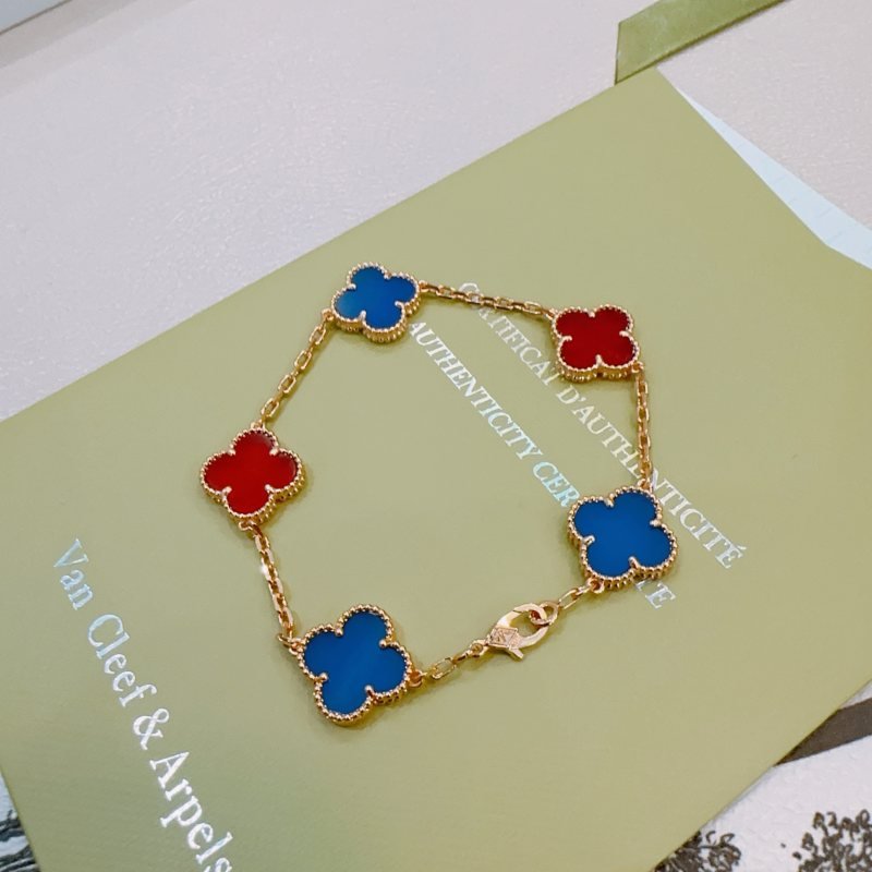 Van Cleef Arpels Alhambra bracelet Gold-toned metal with blue and red clover inlays 17cm