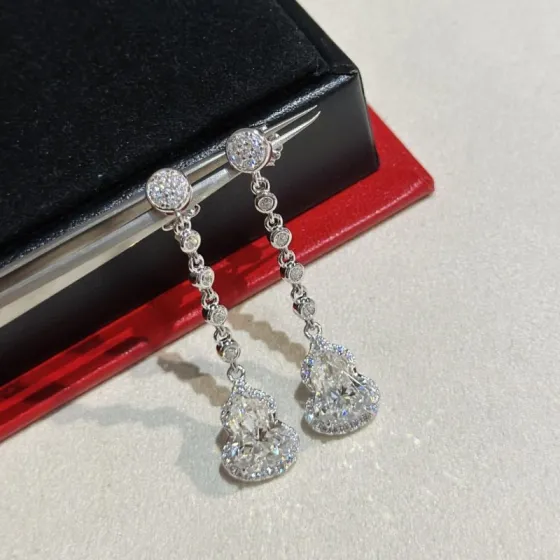 Qeelin Wulu earrings silver-toned metal with clear diamond-like stones 3 5cm drop length