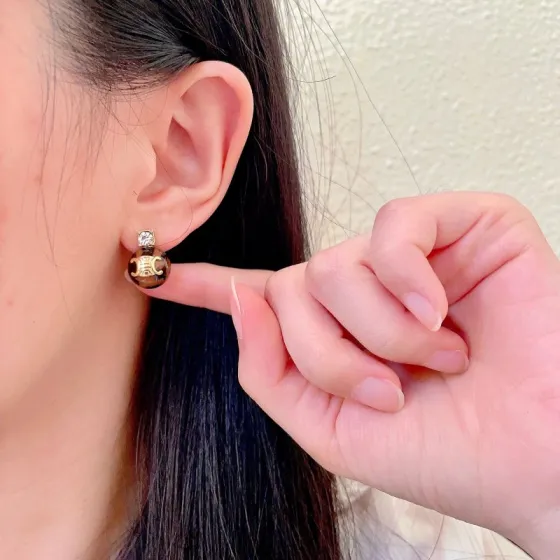 Celine Triomphe Resin Ball Stud Earrings earrings gold-tone metal tortoiseshell brown resin clear cubic zirconia accent 10mm ball diameter standard stud post length