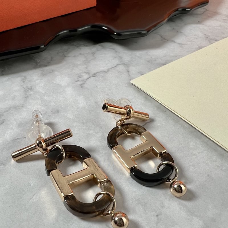 Hermes Sur Mer H d Ancre earrings earrings rose gold plated metal smoky brown and black buffalo horn drop length 3 5cm