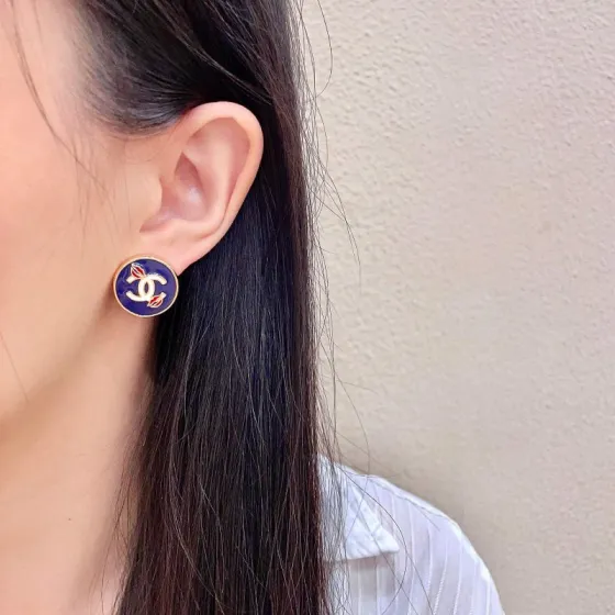 Chanel CC Logo Enamel Round Stud Earrings earrings Gold-tone metal with navy blue enamel white CC logo red enamel lip accents 1 5cm diameter