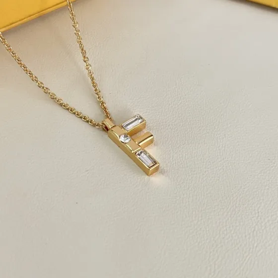 Fendi FF Logo Crystal Pendant Necklace necklace gold-tone metal with clear faceted crystals 45cm with 5cm extender