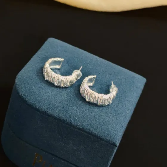 Piaget Pave Textured Hoop earrings silver-toned metal with clear pave stones 15mm hoop diameter