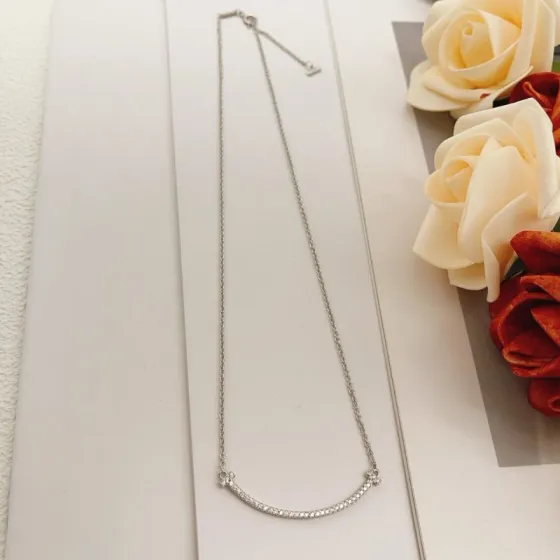 Tiffany Co T Smile necklace silver-toned white gold with clear diamond accents 16-18 inches adjustable
