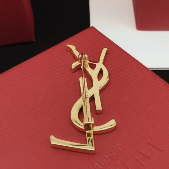Saint Laurent Cassandre Monogram Brooch brooch gold tone metal no gemstones 4 5cm