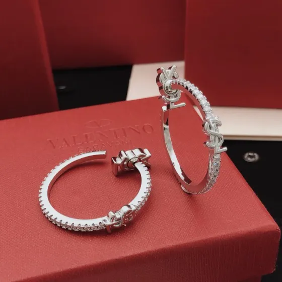 Saint Laurent Cassandre Crystal Hoop earrings silver-toned metal with clear crystal accents 3 5cm diameter