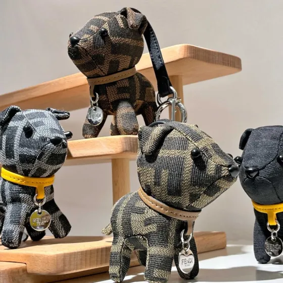 Fendi FF Monogram Puppy Bag Charm pendant Tobacco brown and black FF jacquard fabric tan leather collar silver-tone metal hardware black leather strap black plastic accents 10cm charm with 8cm
