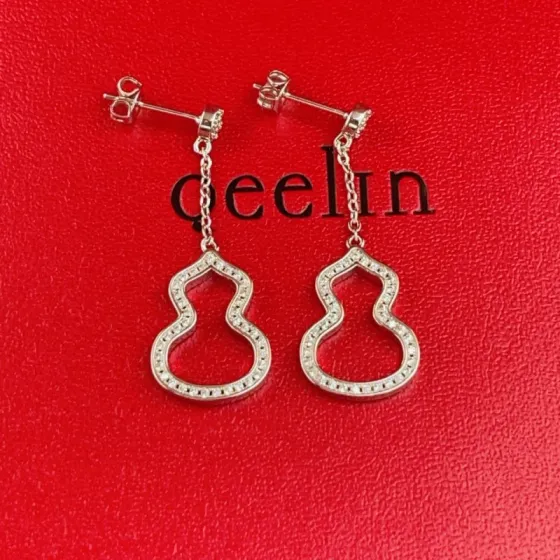 Qeelin Wulu earrings silver-toned white gold with clear diamond accents 2 5cm drop length