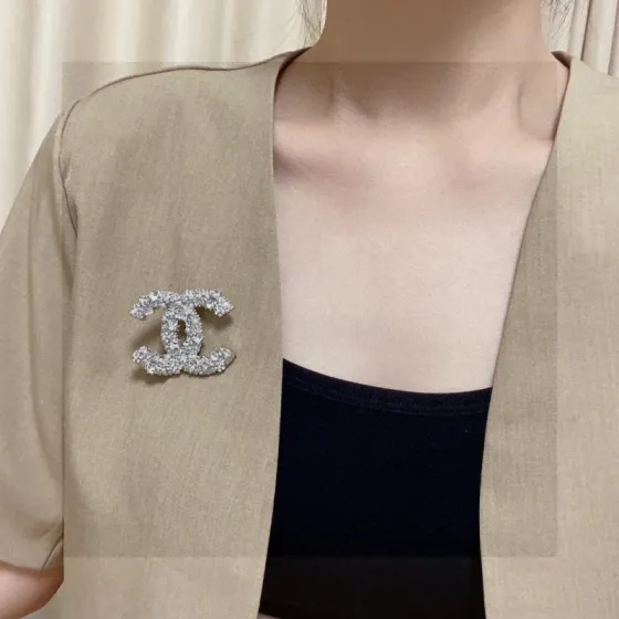 Chanel CC Logo Brooch brooch silver tone metal with clear crystals and white faux pearls 4 5cm width