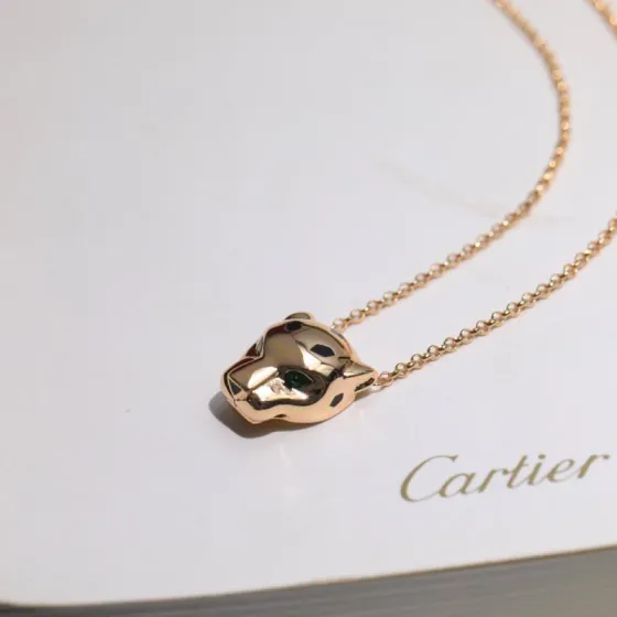 Cartier Panthere de Cartier necklace 18k yellow gold tsavorite green garnet eyes black onyx accents 42cm with 2cm extender