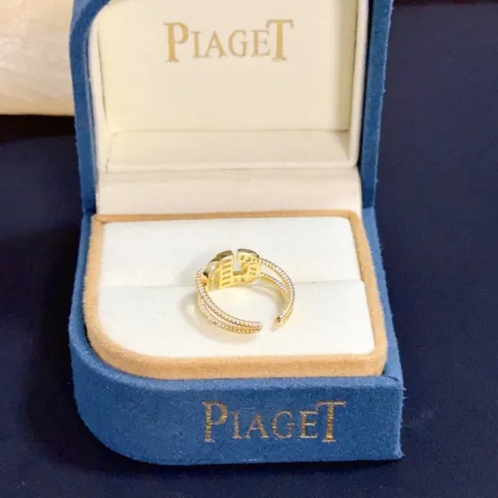 Piaget Possession ring yellow gold with clear diamond accents US 7