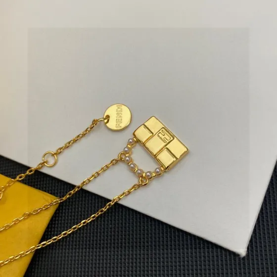 Fendi Baguette Bag Charm Pendant Necklace necklace gold-tone metal with white faux pearl accents 45cm with 5cm extender