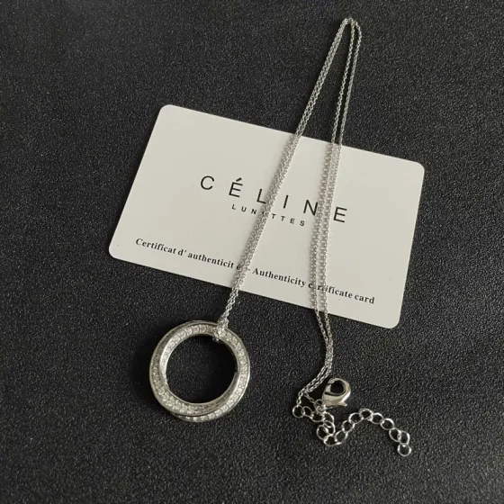 Celine Crystal Circle Pendant necklace Silver-toned metal with clear crystal accents 45cm with 5cm extender