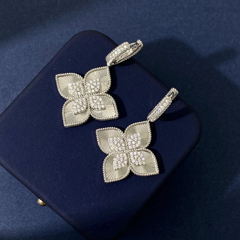 Van Cleef Arpels Vintage Alhambra earrings 18K yellow gold with clear diamond accents 18K white gold with clear diamond accents One Size