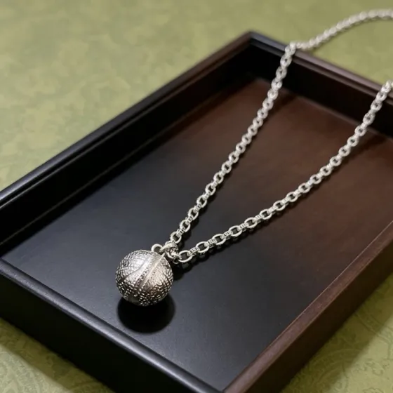 Gucci Anger Forest Basketball Pendant necklace Silver-toned metal with antiqued silver basketball pendant no gemstones 60cm
