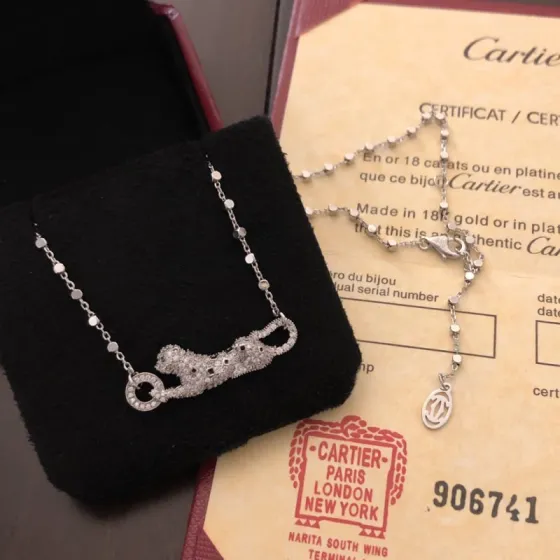 Cartier Panthere de Cartier necklace 18k white gold set with diamonds black onyx spots tsavorite garnet eyes 42cm
