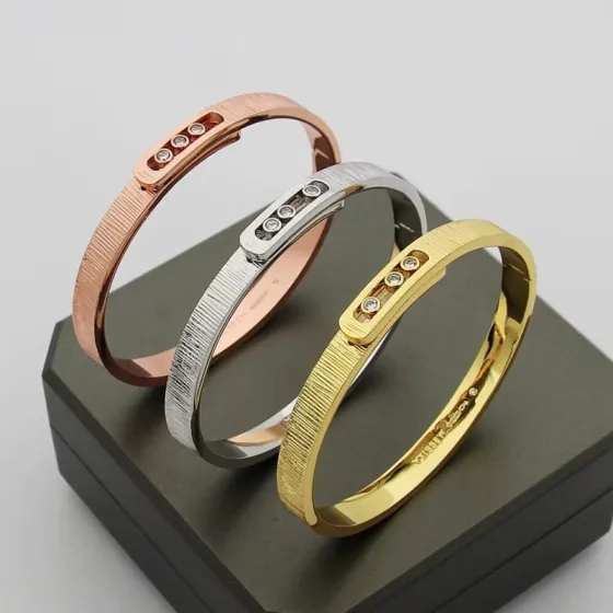 Messika Move Noa bracelet 18K rose gold 18K white gold 18K yellow gold with clear diamond accents 17cm