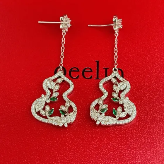 Qeelin Wulu earrings 18K white gold with diamonds and emeralds 4cm drop length