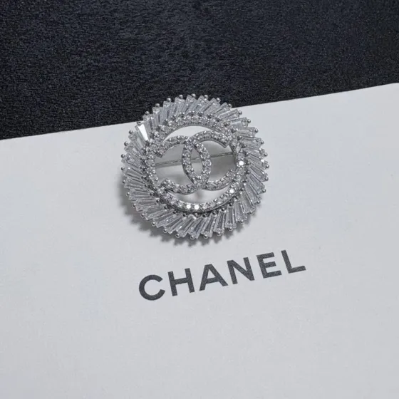 Chanel CC Logo Sunburst Crystal Brooch brooch silver-toned metal with clear crystal stones 3cm diameter