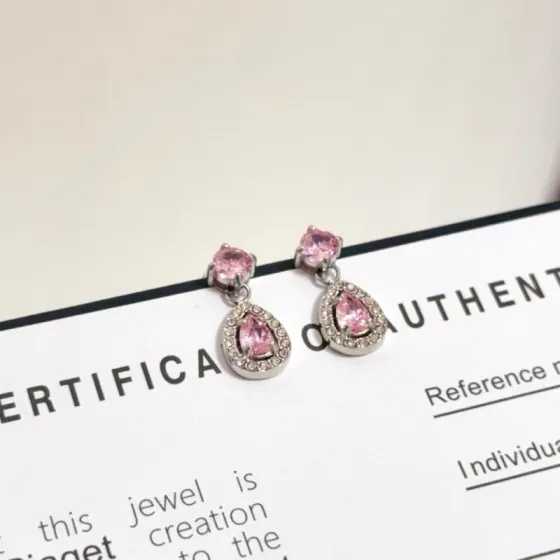 Piaget Rose Passion Teardrop Drop Earrings earrings silver-toned white gold metal with pink sapphire center stones and white diamond halo accents 1 2cm drop length
