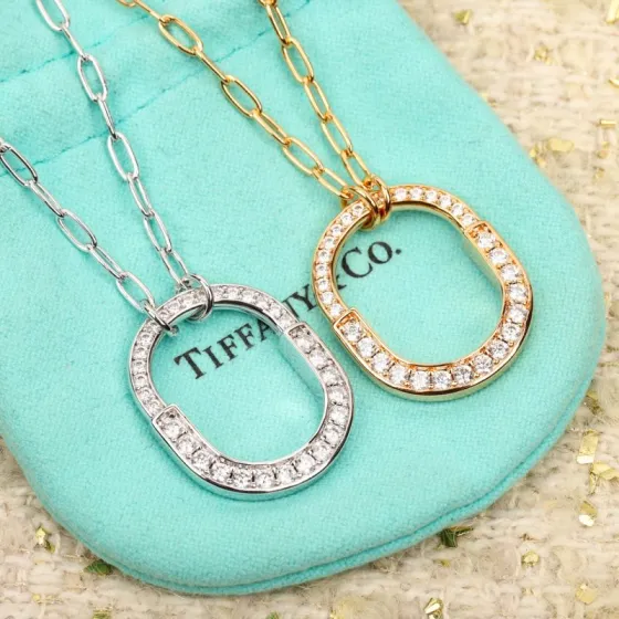 Tiffany Co Tiffany Lock necklace 18K white gold with clear diamonds 18K rose gold with clear diamonds 18 inches
