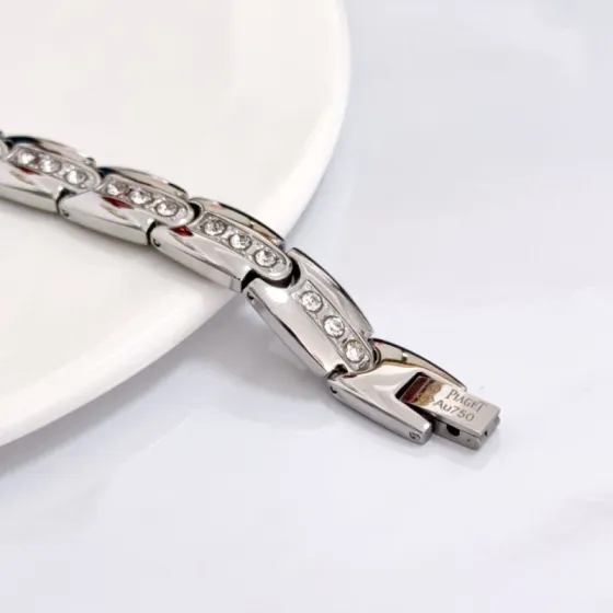 Piaget Au750 Diamond Link Bracelet bracelet Silver-toned 18k white gold with clear round diamonds inner links with black white red accent elements 19cm