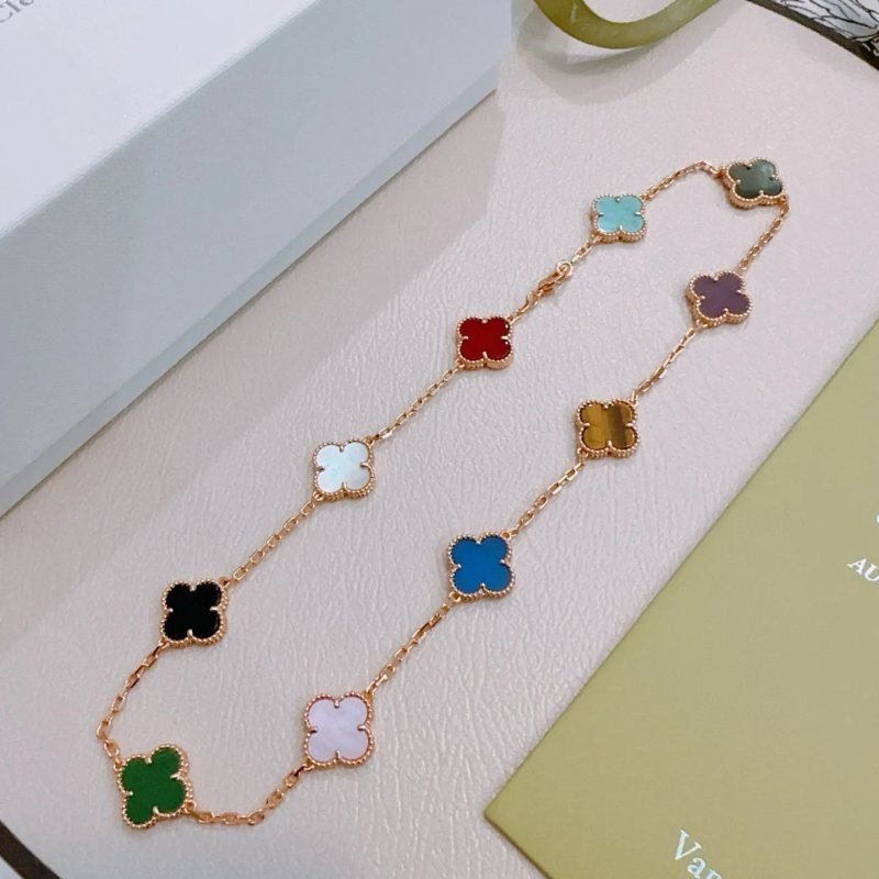 Van Cleef Arpels Alhambra necklace rose gold with multicolor clover inlays red turquoise gray-green purple tiger s eye brown blue light pink mother-of-pearl green malachite black onyx white mother-of-pearl 42cm