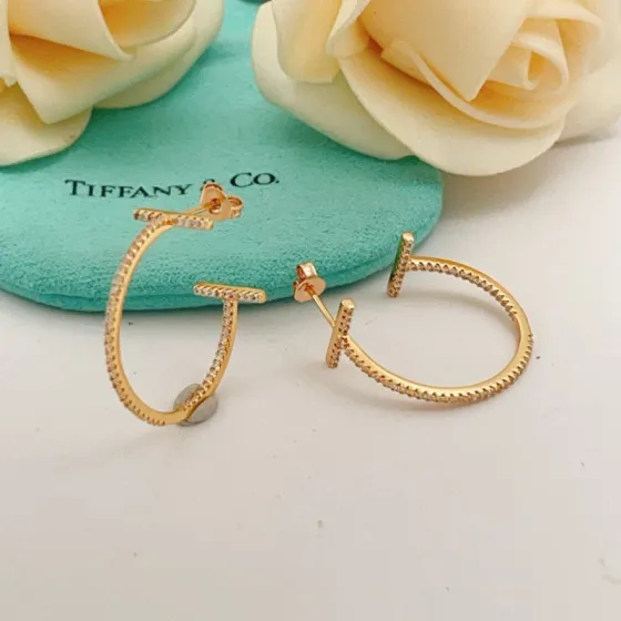 Tiffany Co T Wire Hoop earrings 18k yellow gold with pave set clear diamonds 30mm hoop diameter