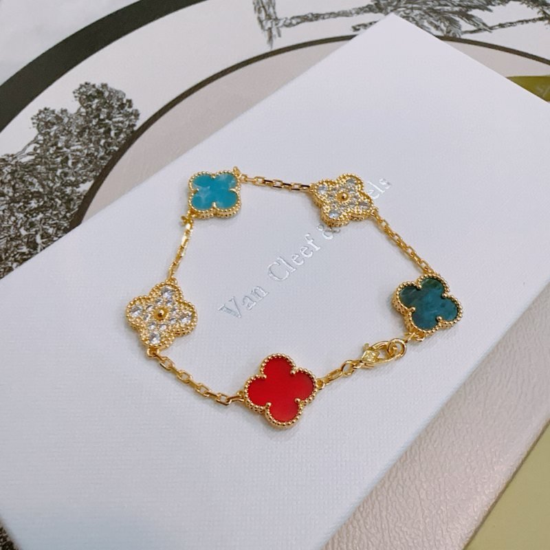 Van Cleef Arpels Alhambra bracelet Gold metal with red turquoise blue teal blue and clear diamond-accented four-leaf clover motifs 17cm