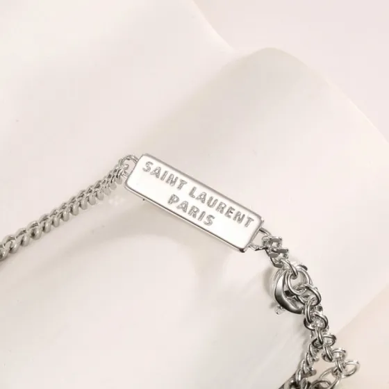 Saint Laurent YSL Monogram Logo Tag bracelet silver-toned metal with clear cubic zirconia stones 16cm with 5cm extension chain