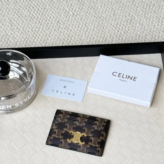 Celine Triomphe card holder dark brown coated canvas with tan Triomphe monogram gold-tone metal hardware black leather trim 10cm x 7 5cm