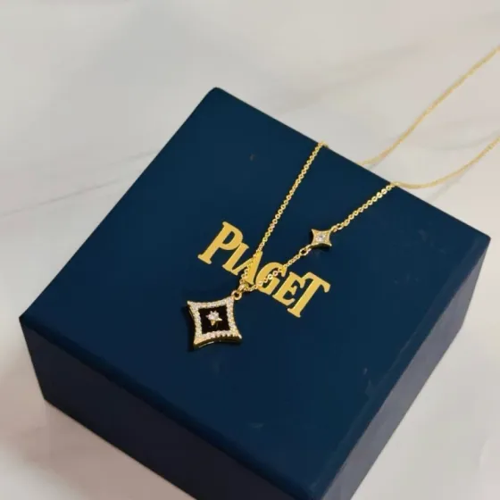 Piaget Possession Star Pendant necklace Yellow gold black onyx clear diamond 42cm
