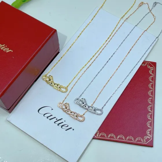Cartier Panthere de Cartier necklace 18k yellow gold 18k rose gold 18k white gold with pave diamonds black onyx spots emerald panther eyes 42cm