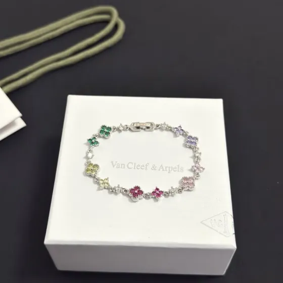 Van Cleef Arpels Alhambra bracelet Silver-toned metal with multicolor gemstones green yellow red pink purple and clear diamond accents 17cm