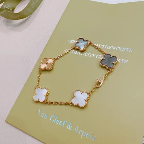 Van Cleef Arpels Alhambra bracelet Rose gold metal with white mother-of-pearl gray mother-of-pearl and guilloche rose gold clover motifs 18cm