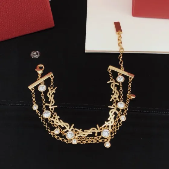 Saint Laurent YSL Monogram Multi-Strand Crystal Bracelet bracelet gold-tone metal with clear faceted crystals 19cm with 3cm extension chain