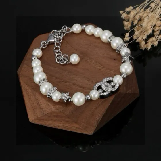 Chanel CC Logo Crystal Star Pearl Bracelet bracelet silver-tone metal white faux pearl clear crystal 18cm with 3cm extension chain