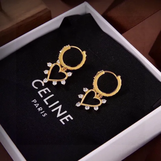Celine Crystal Heart Charm Hoop Earrings earrings gold-tone metal with clear faceted crystals 1 2cm hoop diameter 2 2cm total drop length