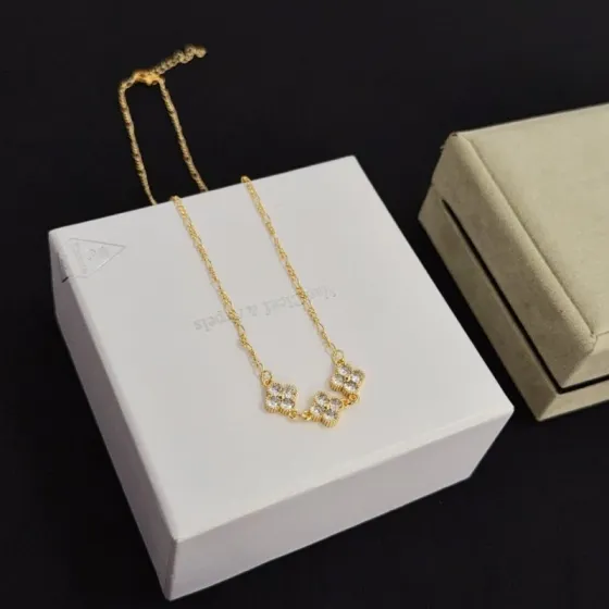 Van Cleef Arpels Alhambra necklace yellow gold with clear diamond accents 42cm