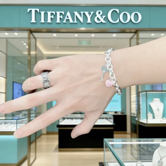 Tiffany Co Return to Tiffany Heart Tag with Key Charm Toggle Bracelet bracelet Sterling silver metal pink enamel heart charm blue sapphire-accented key charm 19cm