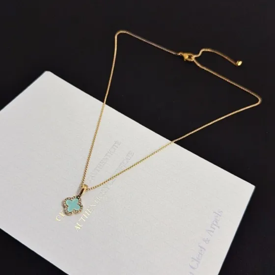 Van Cleef Arpels Alhambra necklace Yellow gold metal with turquoise blue clover inlay and clear diamond accent stones 42cm