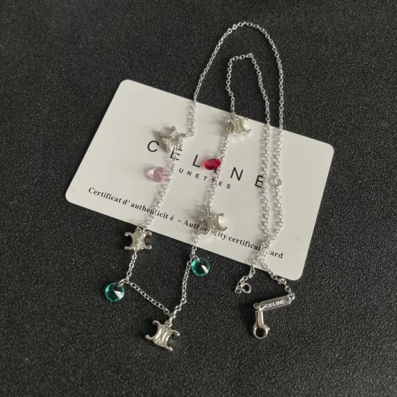 Celine Triomphe Multi Charm Necklace necklace Silver-toned metal with red pink teal and green faceted crystal charms 40cm