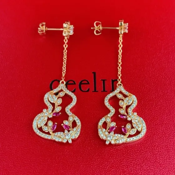Qeelin Wulu Garden earrings rose gold metal with clear diamonds and ruby red gemstones 4 5cm drop length