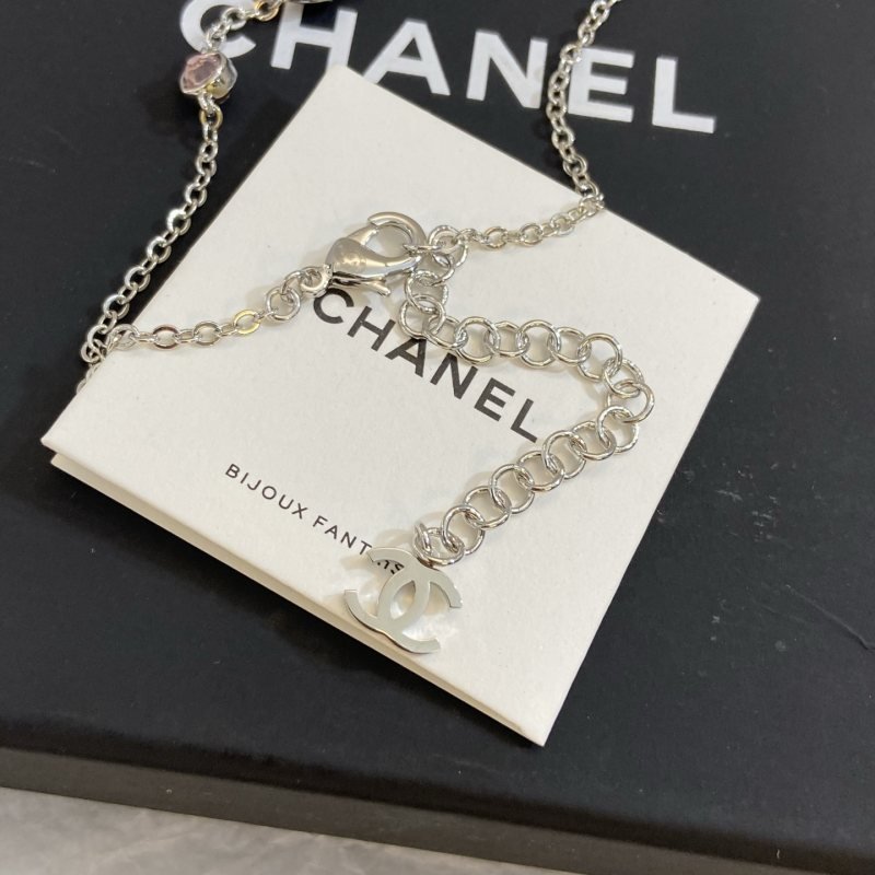 Chanel CC Logo Multicolor Crystal Station Necklace necklace Silver-toned metal with light pink fuchsia pink and burgundy crystal accents light gold-tone CC charm 42cm with 5cm extender