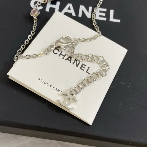 Chanel CC Logo Multicolor Crystal Station Necklace necklace Silver-toned metal with light pink fuchsia pink and burgundy crystal accents light gold-tone CC charm 42cm with 5cm extender
