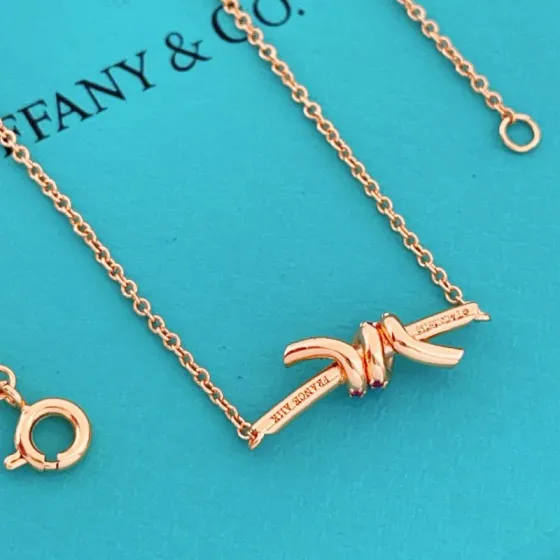 Tiffany Co Knot necklace 18k rose gold with ruby accents 45cm